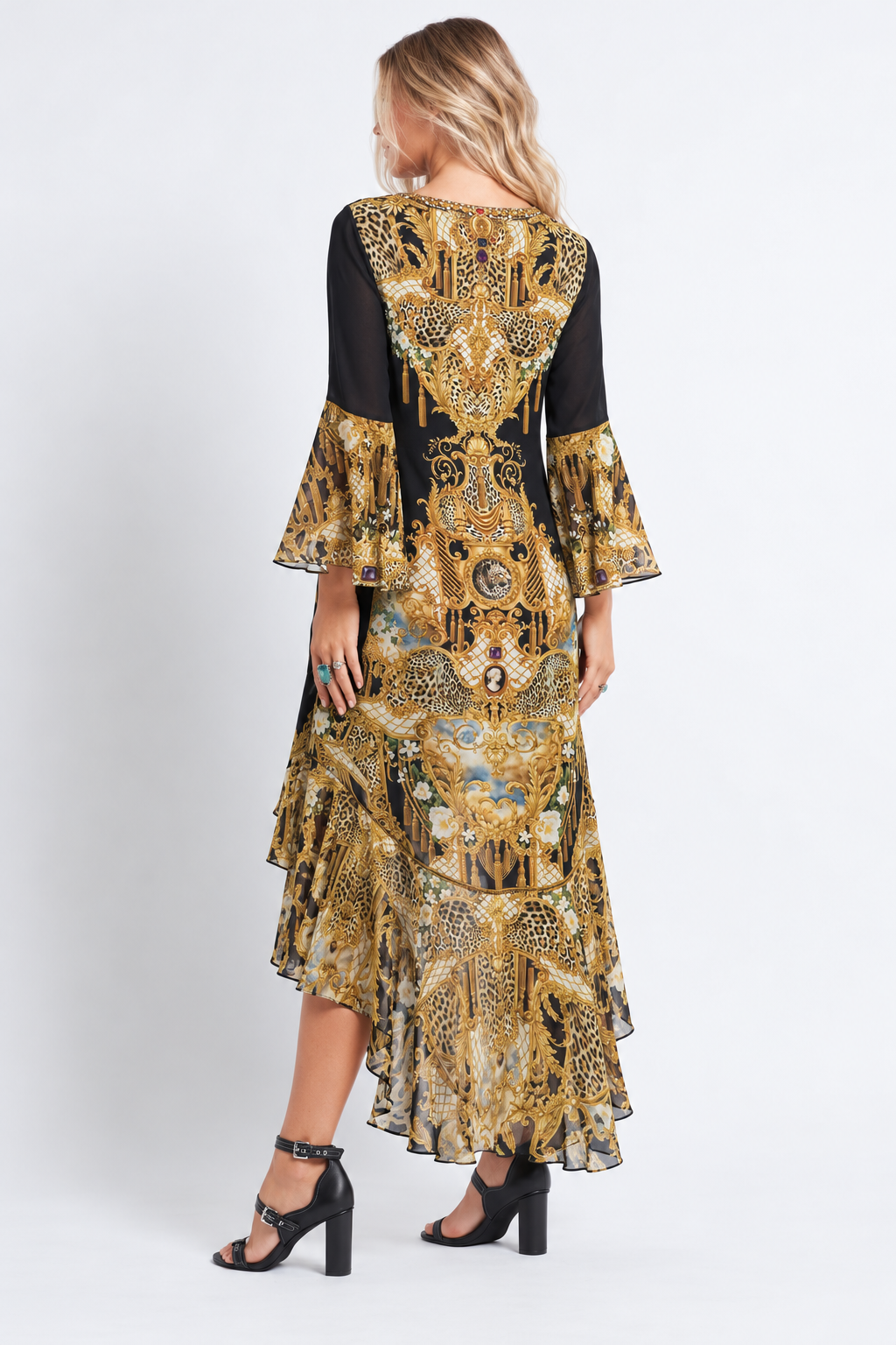 Back view of the Midnight Romance High-Low Dress with Sleeves, featuring gold baroque and leopard motifs