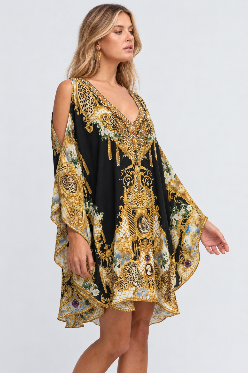 Three-quarter view of the Midnight Romance kaftan dress with crystal embellishment and ornate leopard print