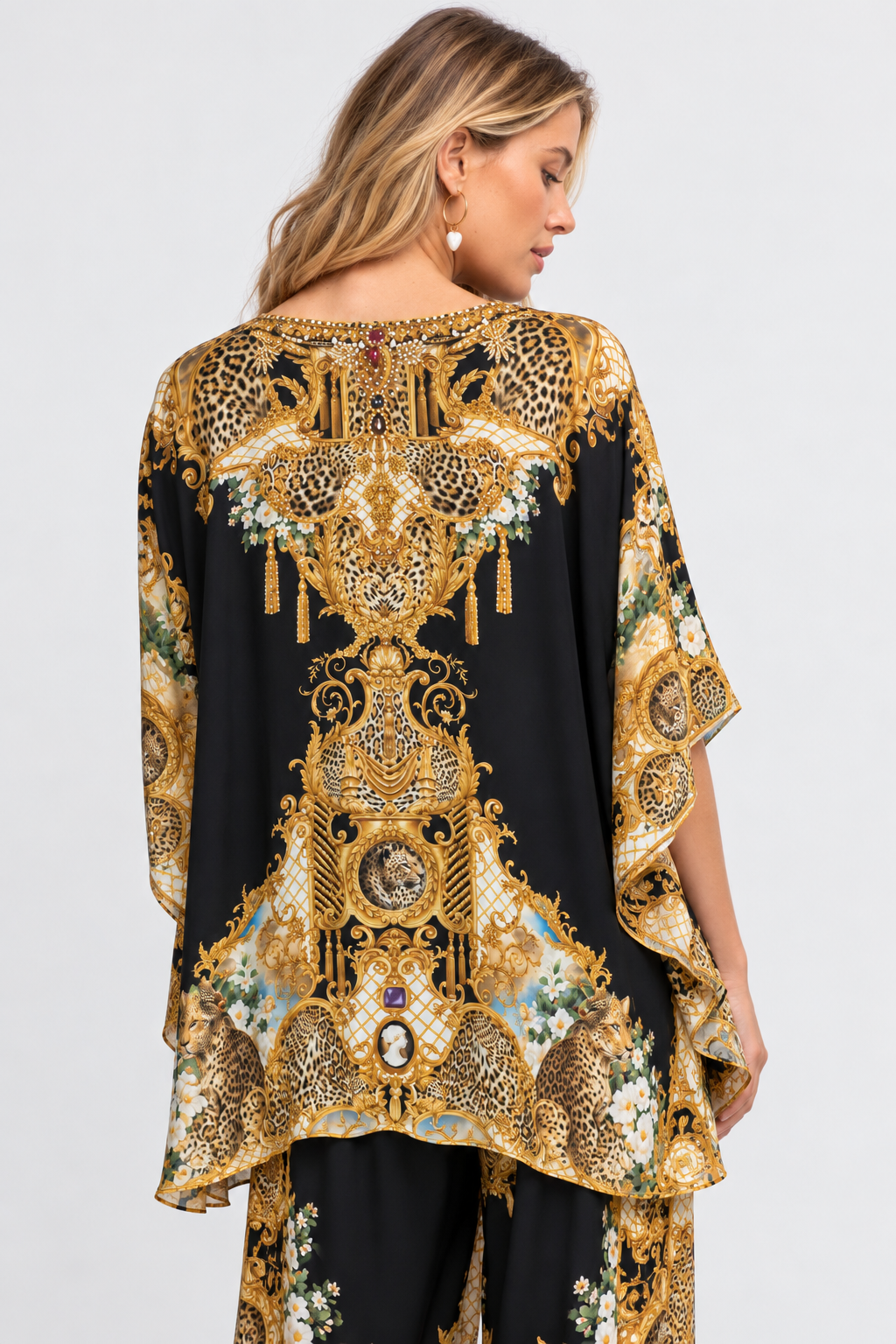 Back view of the Midnight Romance Butterfly Top showing the black-and-gold baroque print and relaxed drape