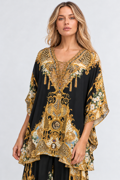 Front detail of the crystal-embellished neckline and gold lacing on the Midnight Romance Butterfly Top
